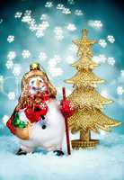 Snowman with Blue Holiday Background