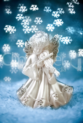 Angel with Blue Holiday Background