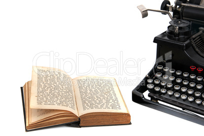 typewriter with old book