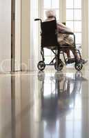 Disabled Senior Woman Sitting In Wheelchair