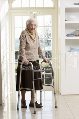 Elderly Senior Woman Using Walking Frame