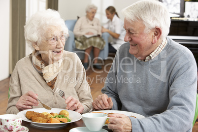 Senior Couple Enjoying Meal Together