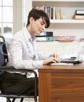 Woman Working From Home Using Laptop