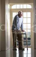 Elderly Senior Man Using Walking Frame