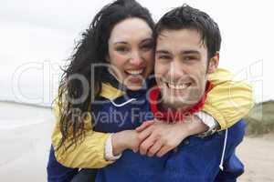 Happy couple on beach in love