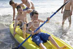Teenage boys kayaking