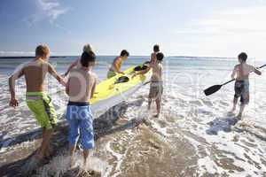 Teenage boys kayaking