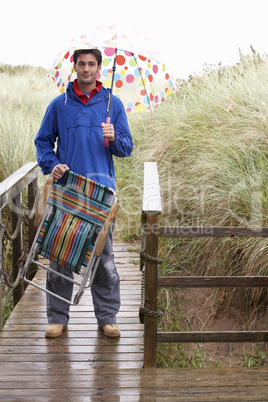 Young man with umbrella