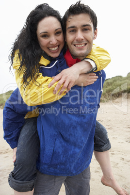 Happy couple on beach in love