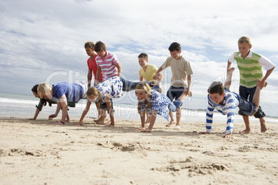 Teenagers playing on beach