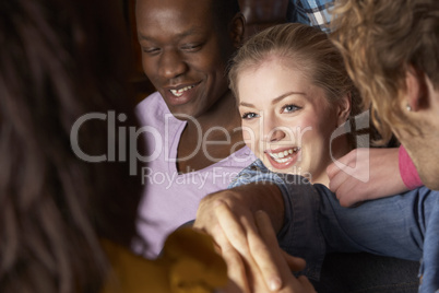 Young friends sitting together