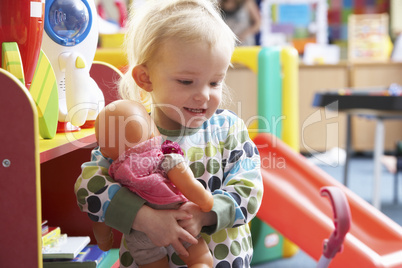 Young girl playing with toys