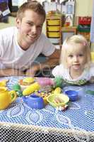 Man with children playing together