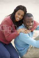 Young couple Embracing on beach