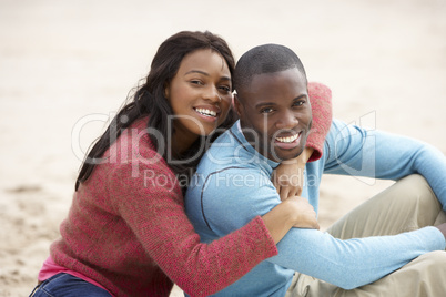 Young couple Embracing on beach
