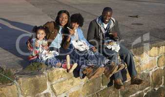 Happy family having picnic