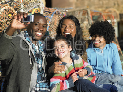Happy family taking photo