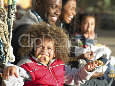 Happy family having picnic