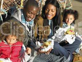 Happy family having picnic