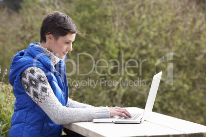 Young woman with laptop computer
