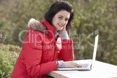 Young woman with laptop computer