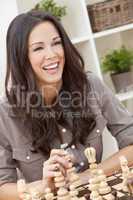 Happy Smiling Beautiful Woman Playing Chess