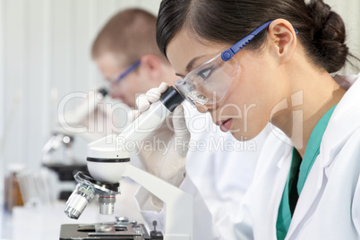 Chinese Female Woman Scientist & Microscope In Laboratory