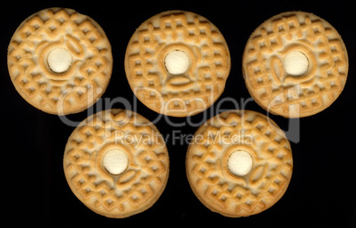five cream cookies mimic olympic rings