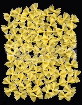 farfalle bow tie pasta over black