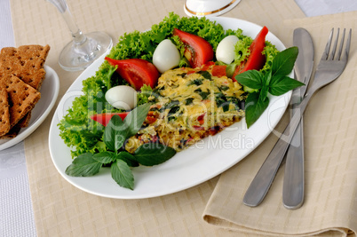 Fried zucchini with basil and vegetables