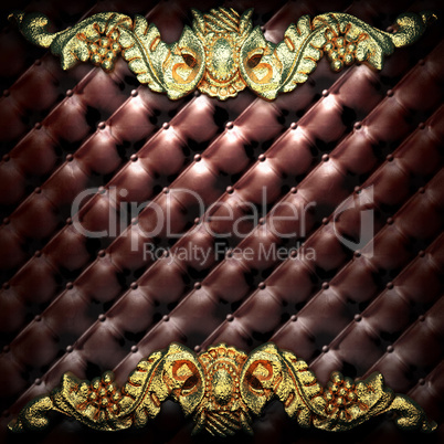 golden ornament on leather