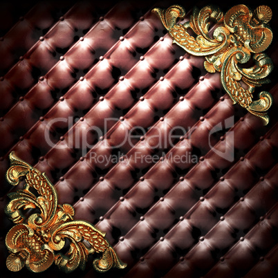 golden ornament on leather