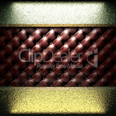 golden plate on leather