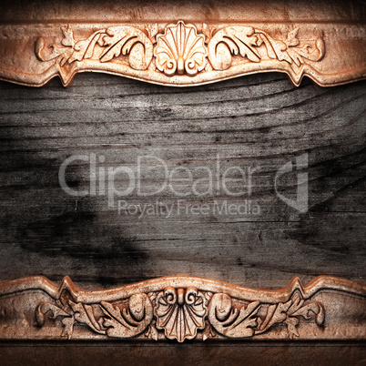 golden ornament on wood