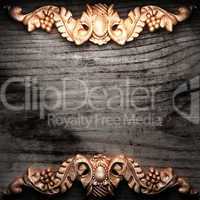 golden ornament on wood