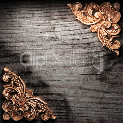 golden ornament on wood