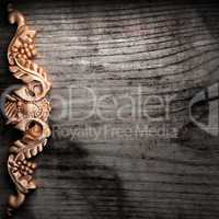 golden ornament on wood