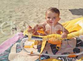 Little boy eating a biscuit