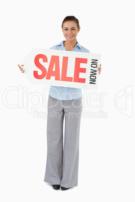 Businesswoman holding sign