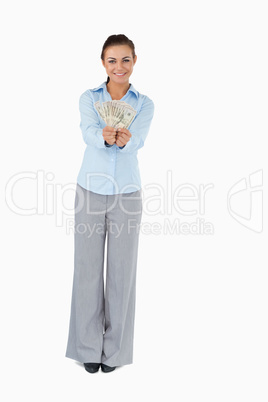 Businesswoman presenting banknotes