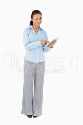 Smiling businesswoman using tablet