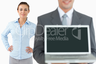 Business team presenting laptop