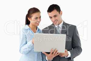Business partners using laptop