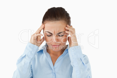 Businesswoman suffering from a headache