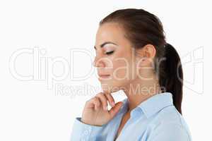 Side view of businesswoman with eyes closed