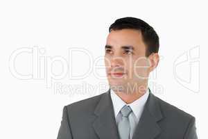 Businessman looking diagonally upwards