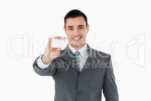 Young businessman showing his businesscard