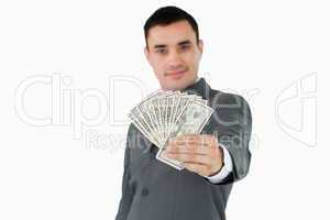 Businessman presenting bank notes