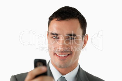 Close up of businessman writing text message