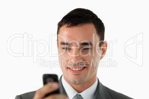 Close up of businessman reading a text message